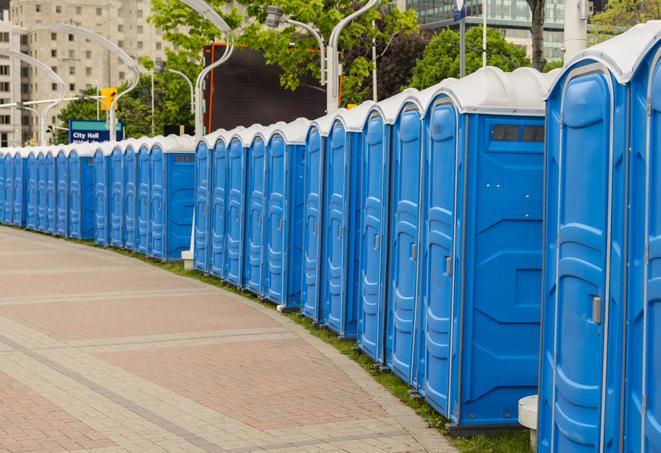 a row of portable restrooms at a fairground, offering visitors a clean and hassle-free experience in sanford